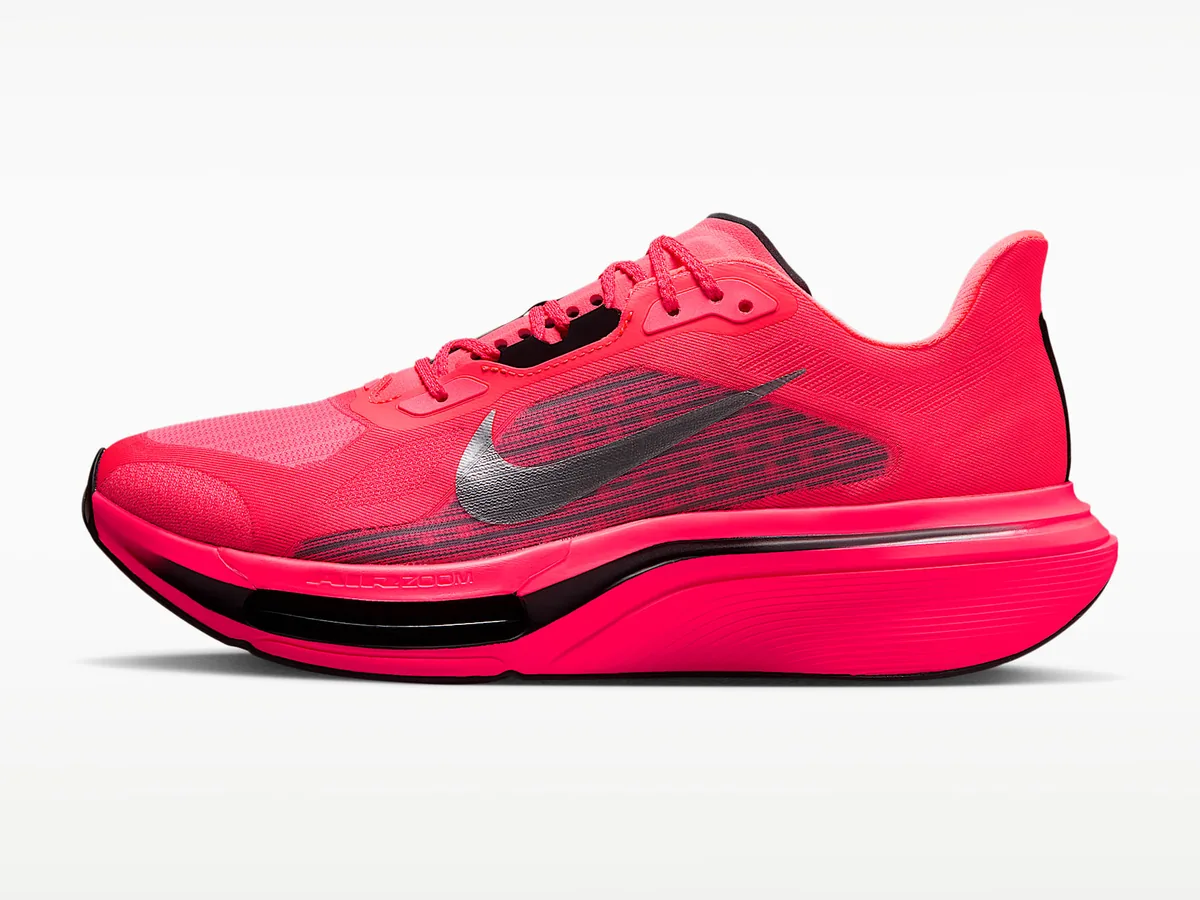 Nike Pegasus Plus 2 running shoe in bright pink, side view